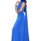 Esta vista lateral del vestido azul eléctrico revela la elegancia escultural del diseño