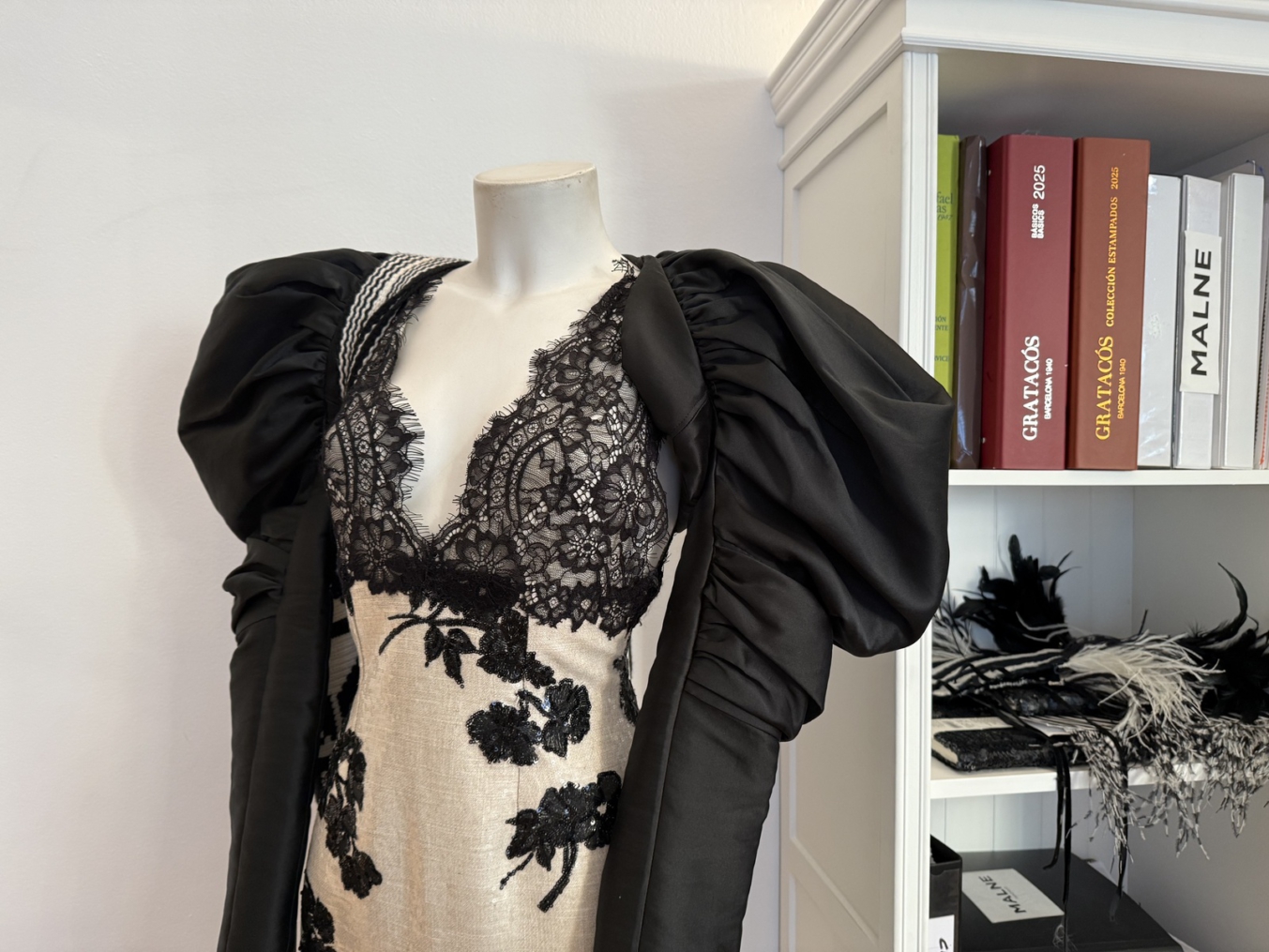 Detail of handmade finishes on a couture garment from the Malne atelier, an example of excellence in craftsmanship in women's fashion.