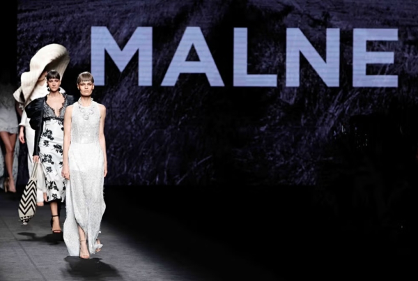 International fashion runway with models walking during a fashion week in Europe, such as Mercedes-Benz Fashion Week Madrid.