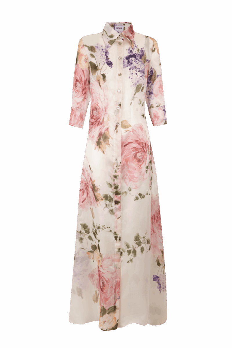 Long silk organza shirt dress with floral print in pink and lilac tones. It has three-quarter length sleeves, a front button fastening and a flowing silhouette for a romantic and elegant look.
