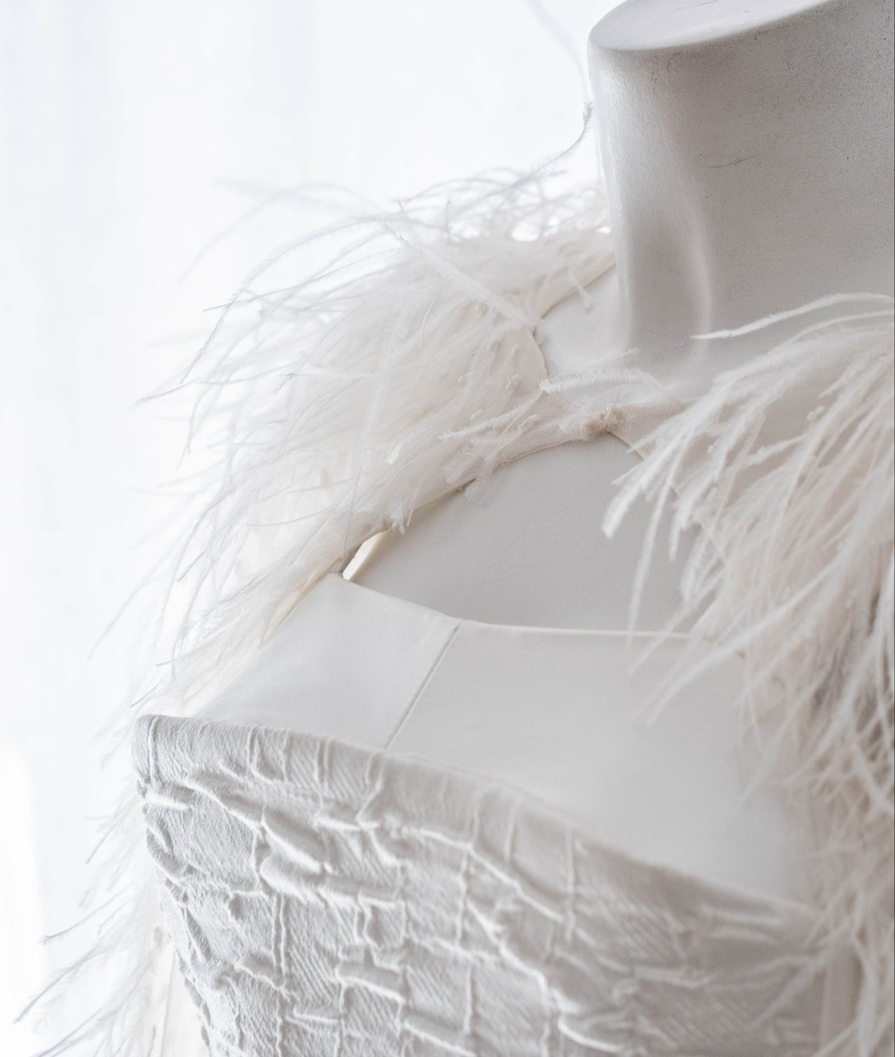 Detail of a Malne wedding dress