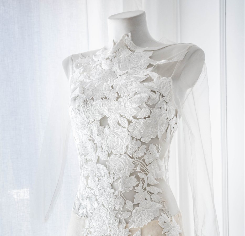 Malne wedding dress on a mannequin in the atelier
